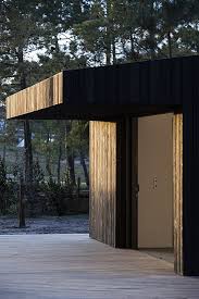 See more ideas about cabins in the woods, small house, cabin. A Quartet Of Black Wood Cabins Set Amongst The Pines In Comporta Portugal Ignant