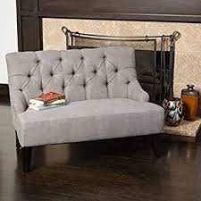 Many settees have more of a formal look, but that doesn't mean that they can't also work well in spaces that are more on the casual side. Amazon Com Mariana Contemporary Tufted Fabric Settee Gray And Dark Brown Furniture Decor