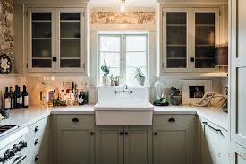 The paneled white kitchen matches beautifully with. 50 Farmhouse Kitchens How To Bring Farmhouse Style Into Your Kitchen Hgtv