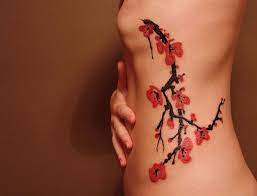 Cherry Blossoms Represent The Fleeting Nature Of Life Cherry Blossom Tattoo Tattoos Rib Tattoo