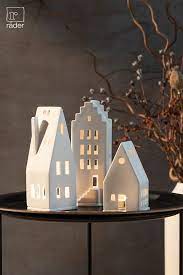 porzellan lichthauser von rader fur ein warmes leuchten zur dunklen jahreszeit christmas interiors clay christmas decorations christmas diy