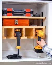 Diy Drill Holder Cordless Drill Storage Rack Plans Saws On Skates Diy Storage Rack Tool Storage Diy Diy Storage Cabinets
