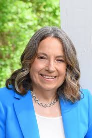 Is there a fitness oriented individual around Troy, NY that could help me  create a fitness regimen to lose my stomach and overall tone up at a local  gym?