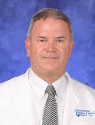 Mark E. Whitaker, MD, FACS