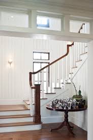 More traditional wainscoting extends up a bit higher. Heighten A Room With Vertical Tongue And Groove Wall Paneling