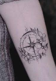One very good design is to include almost all important navigation tools such as a compass, a world map and an anchor like this. What Does A Compass Tattoo Mean