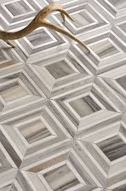 Flooring is the general term for a permanent covering of a floor, or for the work of installing such a floor covering. Great Contemporary Entryway Flooring Floor Design Entryway Tile