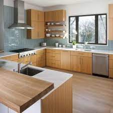 Tucuna Apartment Brick And Wooden Walls In A Modern Apartment With Black Kitchen Modern Wood Kitchen Mid Century Modern Kitchen Design Contemporary Kitchen