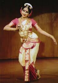 Cheerful young people throwing colorful powder in air, dancing at festival. Girl Dancing In A Traditional Indian Dance Indian Classical Dance Indian Dance Cultural Dance