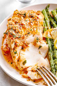 Garlic Butter Cod With Lemon Asparagus Skillet Healthy Fish Recipe Fish Recipes Healthy Health Dinner Recipes Seafood Dinner