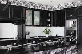 They are constructed on top of a standard trailer frame and are equipped with a number of amenities. Black And White Luxury Kitchen Interior With Modern Furniture Stock Photo Picture And Royalty Free Image Image 24350654
