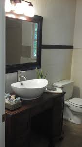 This attractive vanity cabinet presents a modern and contemporary style with its tempered glass countertop, simply and generous construction, white ceramic sink and a luxury mirror. Bathroom Vanity With Vessel Sink 4 Steps With Pictures Instructables