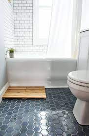 Explore sinks, bathtubs, and showers, creative tile designs, and a variety of counter and flooring ideas. 8 Things I Learned During My Bathroom Tile Renovation Bathroom Tile Renovation Tile Renovation Small Bathroom