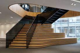 Straight Staircase With Smoked Glass And A Black Timber Handrail Straight Staircase Smoked Glass Office Oak Staircase Design Glass Handrail Staircase