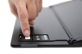 You can use the sim card reader you linked to with an arduino too, it's just not as convenient because you either have to get the signal before the rs232 conversion or convert your arduino's signals to rs232 level too. Insert A Sim Card Into Your Surface