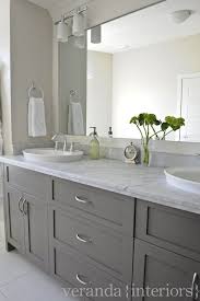 The countertops will create balance in the bathroom area since it will avoid white from being more dominant than grey. This Would Work Great In Our Master And Like The Gray Bathroom Remodel Master Grey Bathroom Cabinets Veranda Interiors