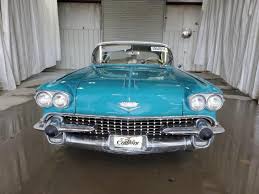 Image result for Turquoise 1958 Cadillac