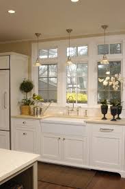 The classic way to use a window in a kitchen is to situate the sink beneath it since almost everyone enjoys looking outside while washing dishes or preparing food. Large Kitchen Window Over Sink 6 Kitchen Remodel Kitchen Sink Window Kitchen Remodel Small