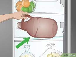 Remove the cap from the jug and pour its contents out into the sink. 3 Simple Ways To Clean A Growler Wikihow