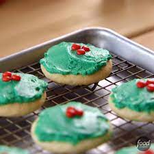 At this point you can divide the frosting into different bowls and add drops of food coloring… i didn't add food coloring this time, but when the cookies are completely cooled start icing them… you can use a dinner knife… but i'm in love with this pioneer woman silicone spatula. Food Network How To Make Ree S Christmas Cake Cookies Facebook