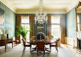 In this combined space, extending the kitchen floor tile out into the living room helps separate the cooking and eating area. 36 Of The Best Dining Rooms Of 2016 Architectural Digest