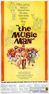 The music man is a 1957 musical with music and lyrics written by meredith willson about a traveling salesman by the name of harold hill who arrives in river city, iowa, passing himself off as a leader and this is the signature song from the musical and is commonly performed by marching bands. The Music Man 1962 Film Wikipedia