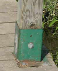 This keeps the wood from soaking up damaging water. Deck Railing Post Anchor Install Posts To Deck Without Notching Posts