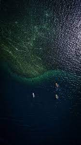 Pin By K E Stanton On Down To Earth Ocean Wallpaper Mkbhd Wallpapers Dark Wallpaper