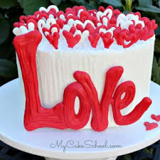 Red roses are a symbol of love, so make one the highlight of your valentine's day cake. My Cake School Cake Decorating Classes Online