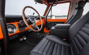 Customize the interior cab of your ford bronco with the many custom interior components we offer, many of which are tbp exclusives! This 1974 Ford Bronco Packs A Coyote V8 Plus A Modern Interior