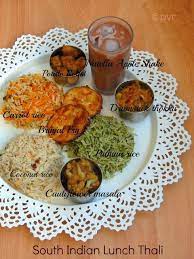 While samosas were not peeping hot they were good. South Indian Lunch Thali With Nutella Apple Shake A Virtual Birthday Party For Manjula Lunch Recipes Indian Indian Food Recipes Lunch