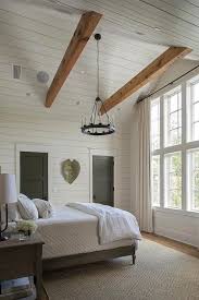 Cottage Bedroom With Gray Shiplap Vaulted Ceiling Features Two Oak Wood Beams And A Small Can Vaulted Ceiling Living Room Vaulted Ceiling Bedroom Small Bedroom