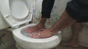 Flush with a pail of water. How To Unclog A Toilet Lovetoknow
