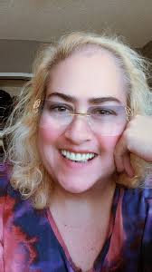 Family or solo pics by the leaning pink house today tomorrow