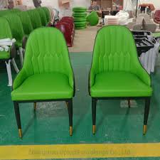 Luxury dining room with fleur patterned chairs and marble dining table lighted by a glamorous chandelier that hung from the tray ceiling designed with intricate details. China Luxury Dining Room Furniture Green Restaurant Chairs Sp Ec205 China Cafe Chair Lobby Chair