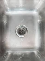 stainless steel sink plug hole close up