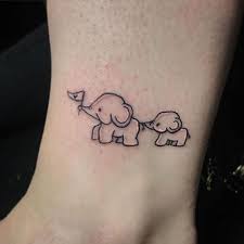 Little Cartoon Elephant Tattoo Design Best Elephant Tattoos Cute Elephant Tattoo Designs And Coo Tattoos For Daughters Cute Elephant Tattoo Elephant Tattoos