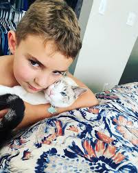 Kitten update! The girls carry them around swaddled up like they're babies  🤣 Joey our other cat isn't so sure about them…he won't attack them bc he's  the sweetest guy but starts