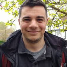 How do you use Multiple Linear Regression to deseasonalize a monthly time  series?