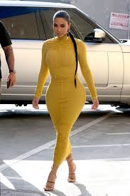 Kim kardashian's best outfits and style moments. Pin By Richelle On Jenners And Kardashians Kim Kardashian Style Dress Kim Kardashian Outfits Tight Yellow Dress
