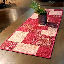 Quilted table runner pattern interesting pattern for quilted table runner the rick rack pattern running in between gives the table runner a stunning appeal. Stacks Fat Quarter Table Runner Freemotion By The River
