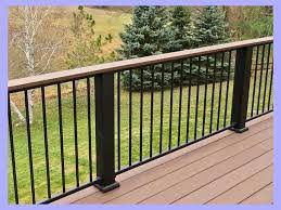 This deck railing combines richly stained wood with horizontal metal rods in an aged bronze finish to make the staircase a focal point of the yard. 32 Diy Deck Railing Ideas Designs That Are Sure To Inspire You Railingideas Deck Railing Design Outdoor Deck Deck Balustrade Ideas
