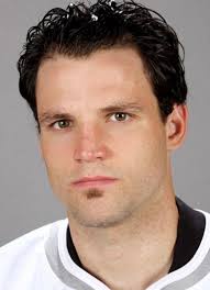 Player photos for the 2003-04 Kelowna Rockets at hockeydb.com