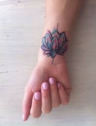 Watercolor Lotus Tattoo Mandala Yo Tattoo In 2020 Flower Wrist Tattoos Wrist Tattoos For Women Wrist Tattoo Cover Up