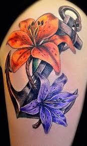 Traditional flowers with lighthouse and anchor tattoo design. Love Itt Anchor Flower Tattoo Anchor Tattoos Flower Tattoo Shoulder