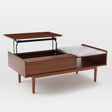 The most common coffee table with storage material is wood. Mid Century Pop Up Storage Coffee Table West Elm United Kingdom