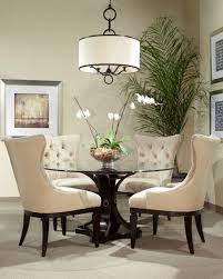 This glass dining table is ideal for any dining room set, giving a clean and polished look to any room. Glass Top Round Kitchen Table Sets Ideas On Foter