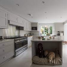 Find out what flooring works best with grey kitchen cabinets! Look Inside This Elegant Victorian Home Filled With Antiques Kitchen Remodel Kitchen Design Kitchen Remodel Cost