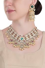 Riana Jewellery Featuring A 22k Gold Plated Jodhpur Style White Necklace Studded With Green S Stone Necklace Set Diamond Jewelry Set Silver Jewelry Accessories