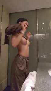 ENF Asian girl undressing spots camera - Unexpected nude